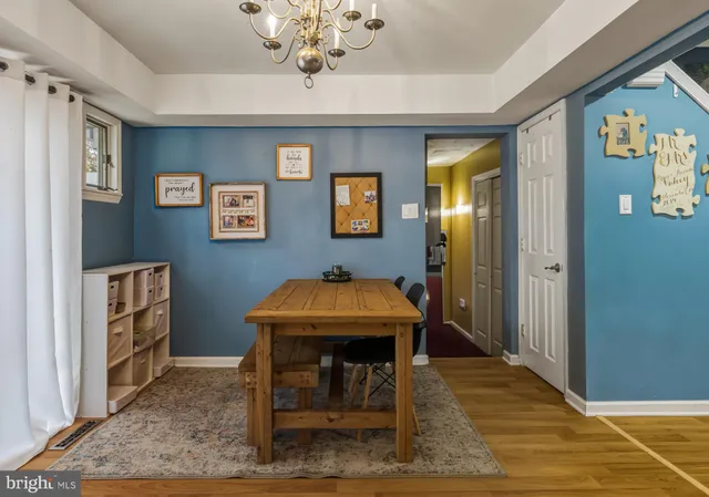 a view of a bathroom with a sink and mirror
