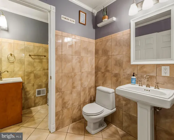 a bathroom with a shower and a sink