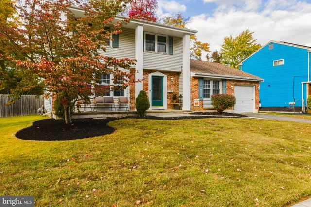 a front view of a house with swimming pool