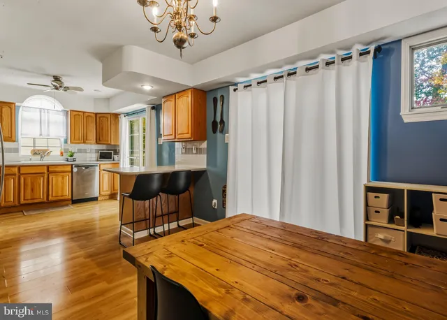 a bed room with a bed and a chair