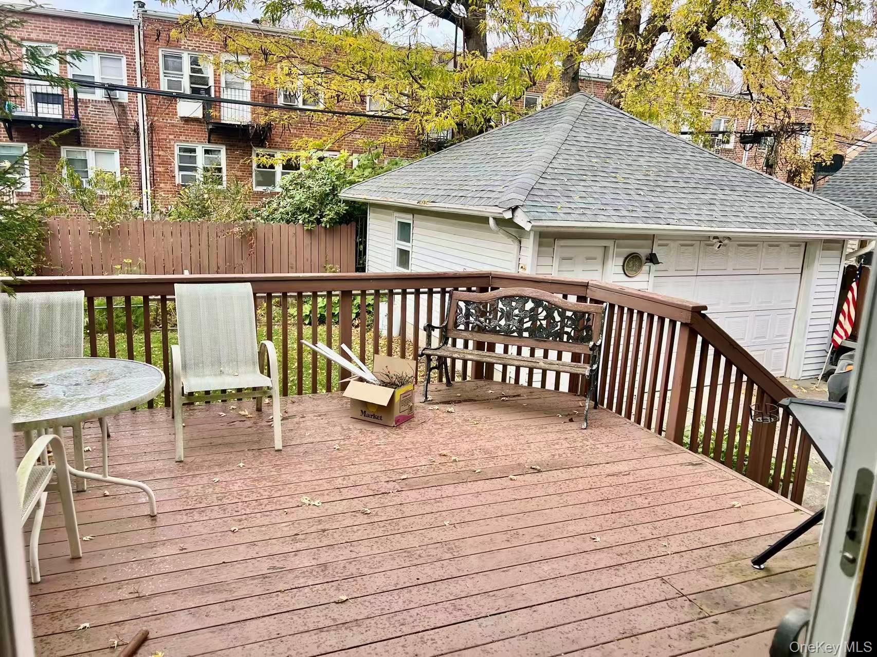 149-15 15th Road Queens, NY 11357 - Photo 18 of 20 a view of a wooden deck with chairs