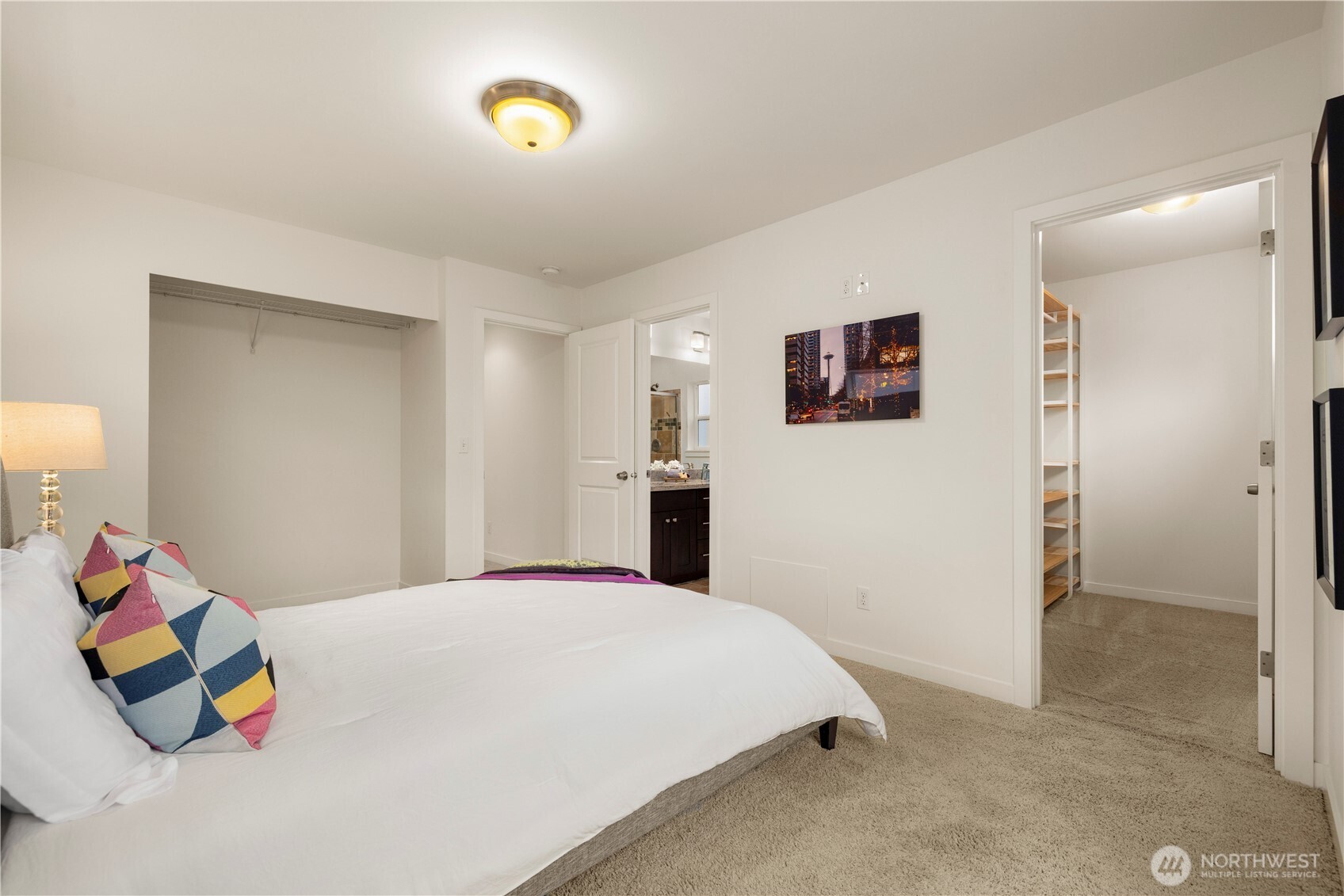 1029 Southwest 124th Street Burien, WA 98146 - Photo 19 of 40 a bedroom with a bed and a couch