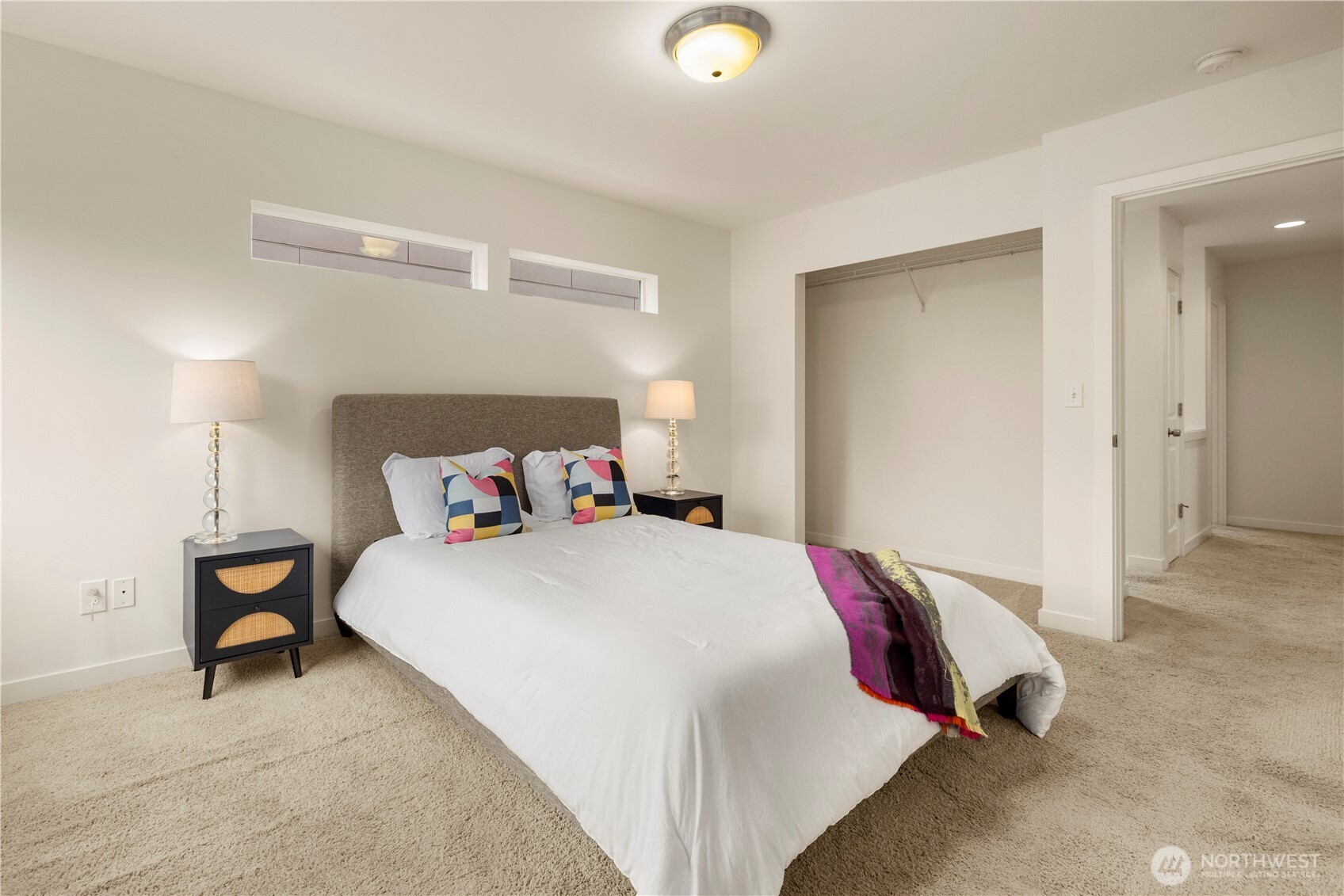 1029 Southwest 124th Street Burien, WA 98146 - Photo 20 of 40 a bedroom with a bed and a lamp