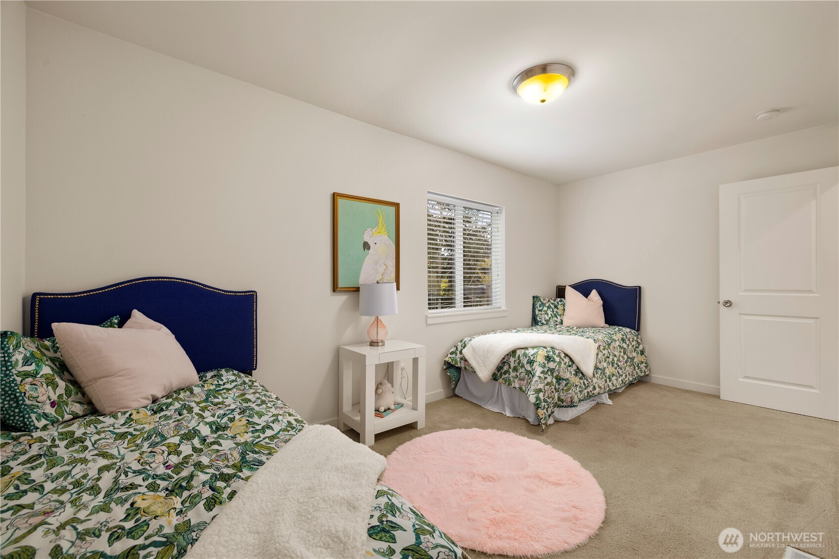 1029 Southwest 124th Street Burien, WA 98146 - Photo 25 of 40 a bedroom with a bed and window