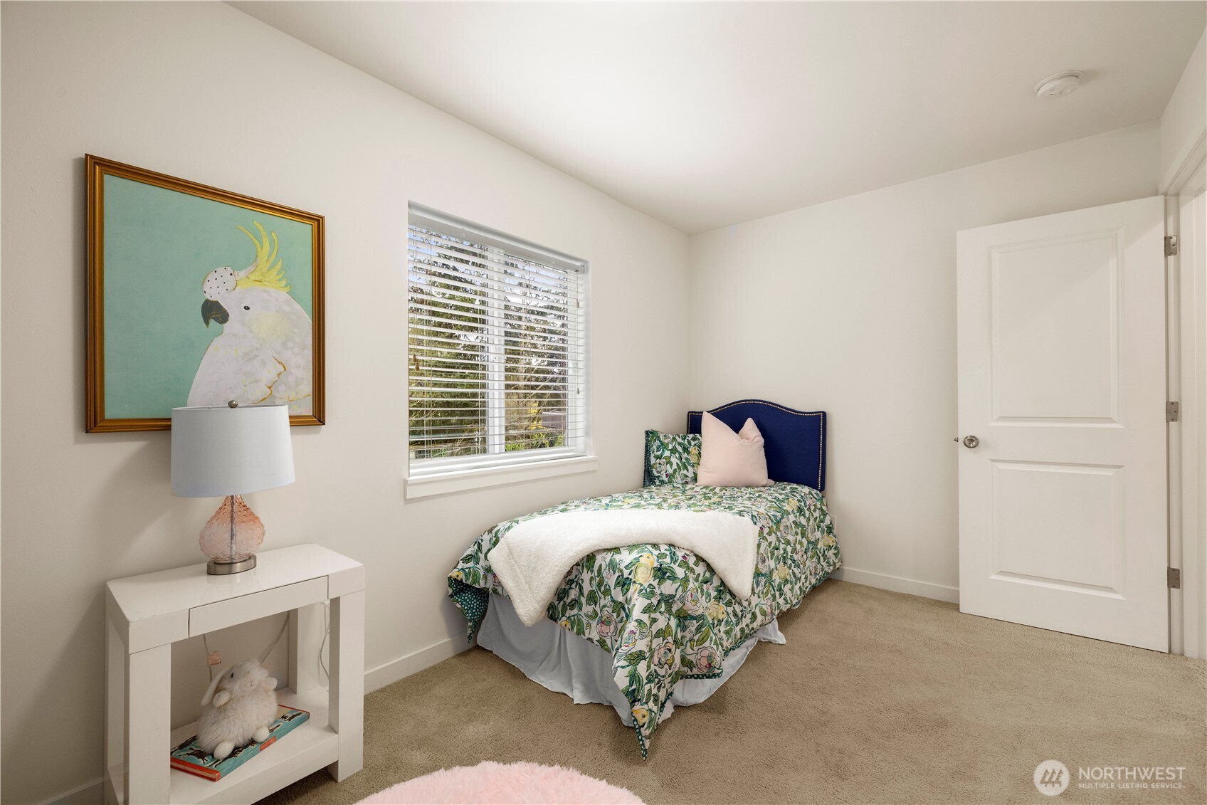 1029 Southwest 124th Street Burien, WA 98146 - Photo 26 of 40 a bedroom with a bed and a window