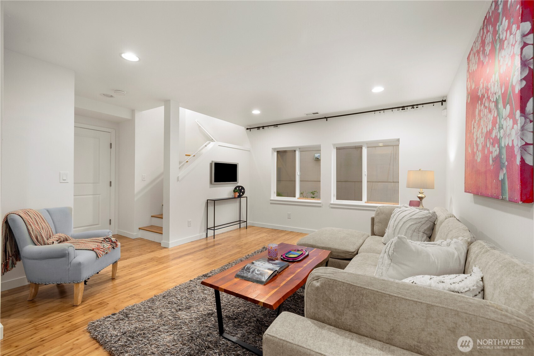 1029 Southwest 124th Street Burien, WA 98146 - Photo 29 of 40 a living room with furniture and a flat screen tv