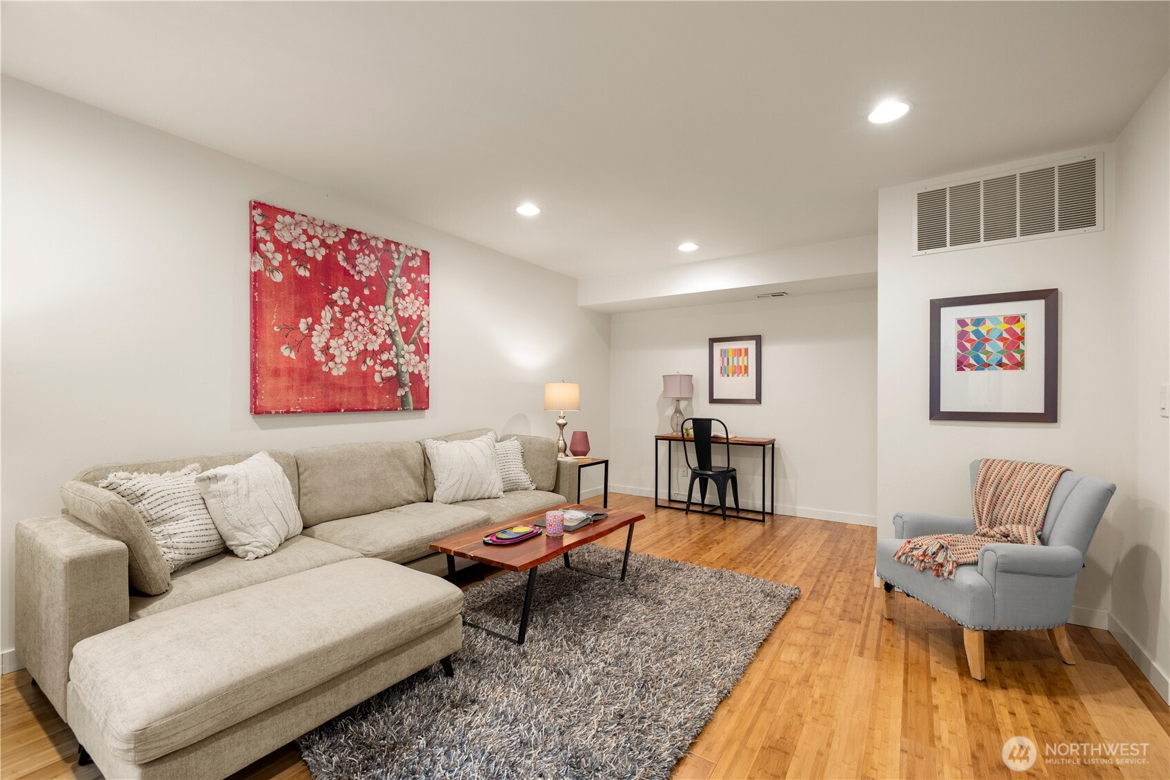 1029 Southwest 124th Street Burien, WA 98146 - Photo 31 of 40 a living room with furniture and wooden floor