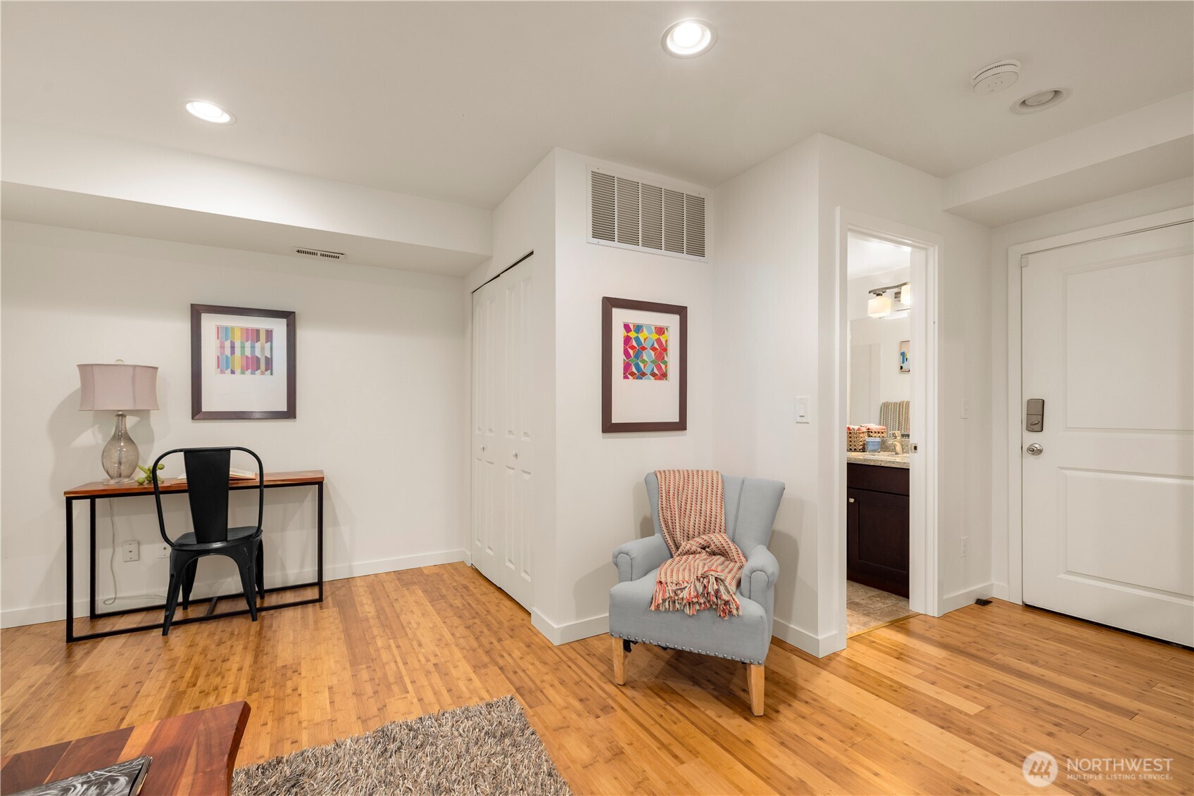 1029 Southwest 124th Street Burien, WA 98146 - Photo 32 of 40 a bedroom with a bed and a table