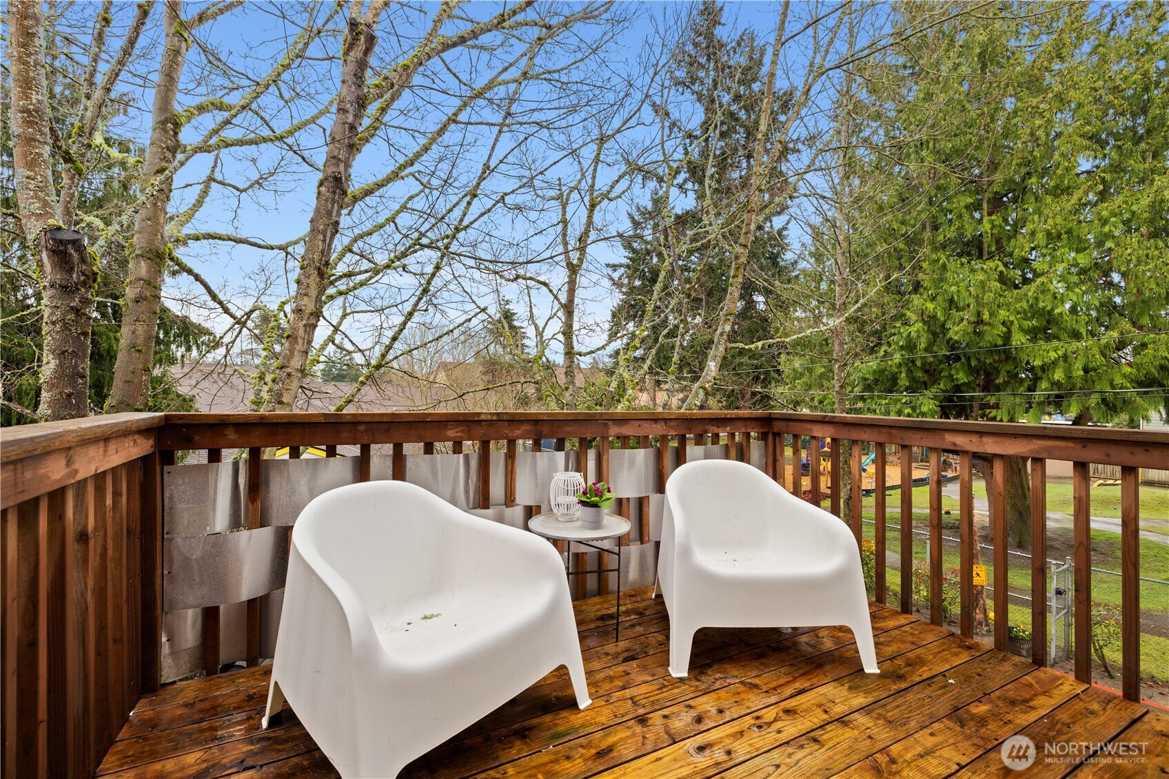 1029 Southwest 124th Street Burien, WA 98146 - Photo 35 of 40 a view of a chair and table in the balcony