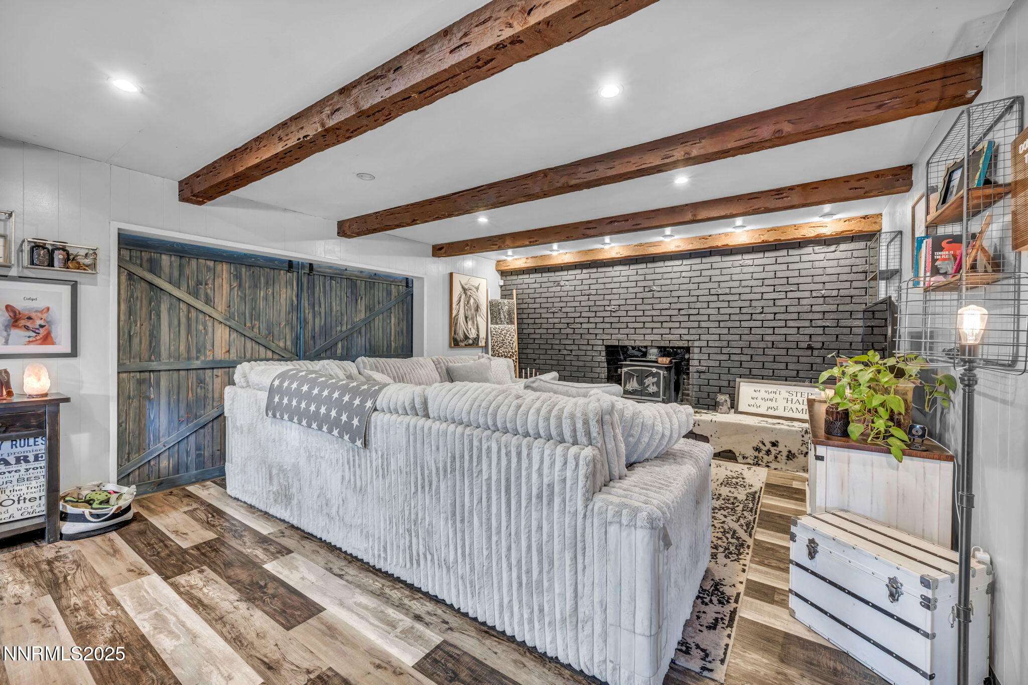 2998 Alcorn Road Fallon, NV 89406 - Photo 14 of 42 a bedroom with furniture and a fireplace