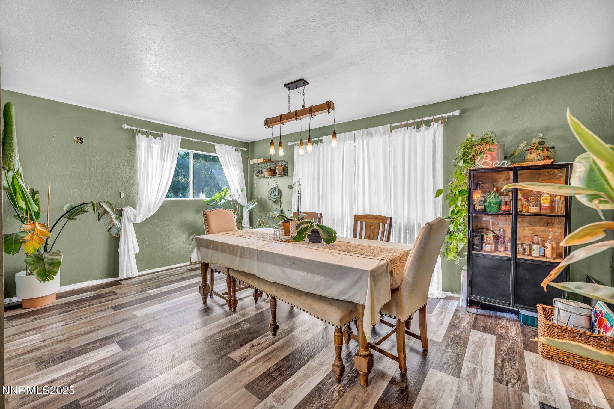 2998 Alcorn Road Fallon, NV 89406 - Photo 16 of 42 a workspace with furniture window and wooden floor