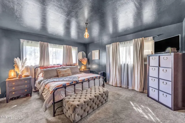 a kitchen with a sink cabinets and window