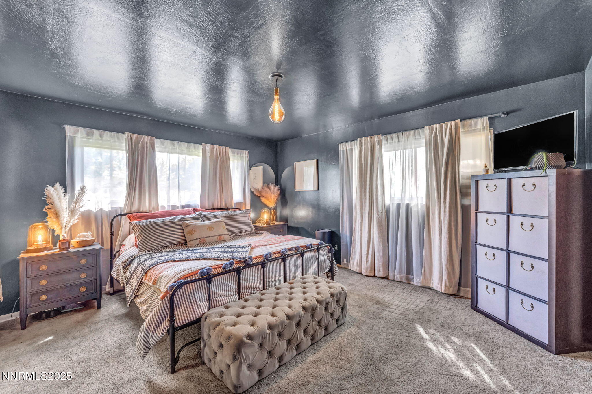 2998 Alcorn Road Fallon, NV 89406 - Photo 23 of 42 a bedroom with a large bed and a window