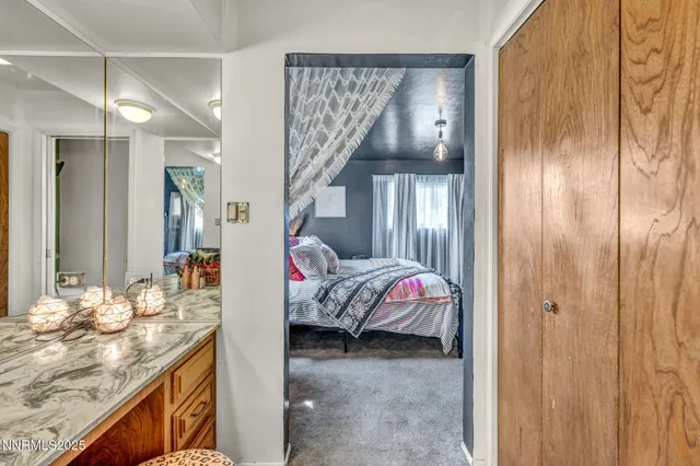 a view of a street with a small yard