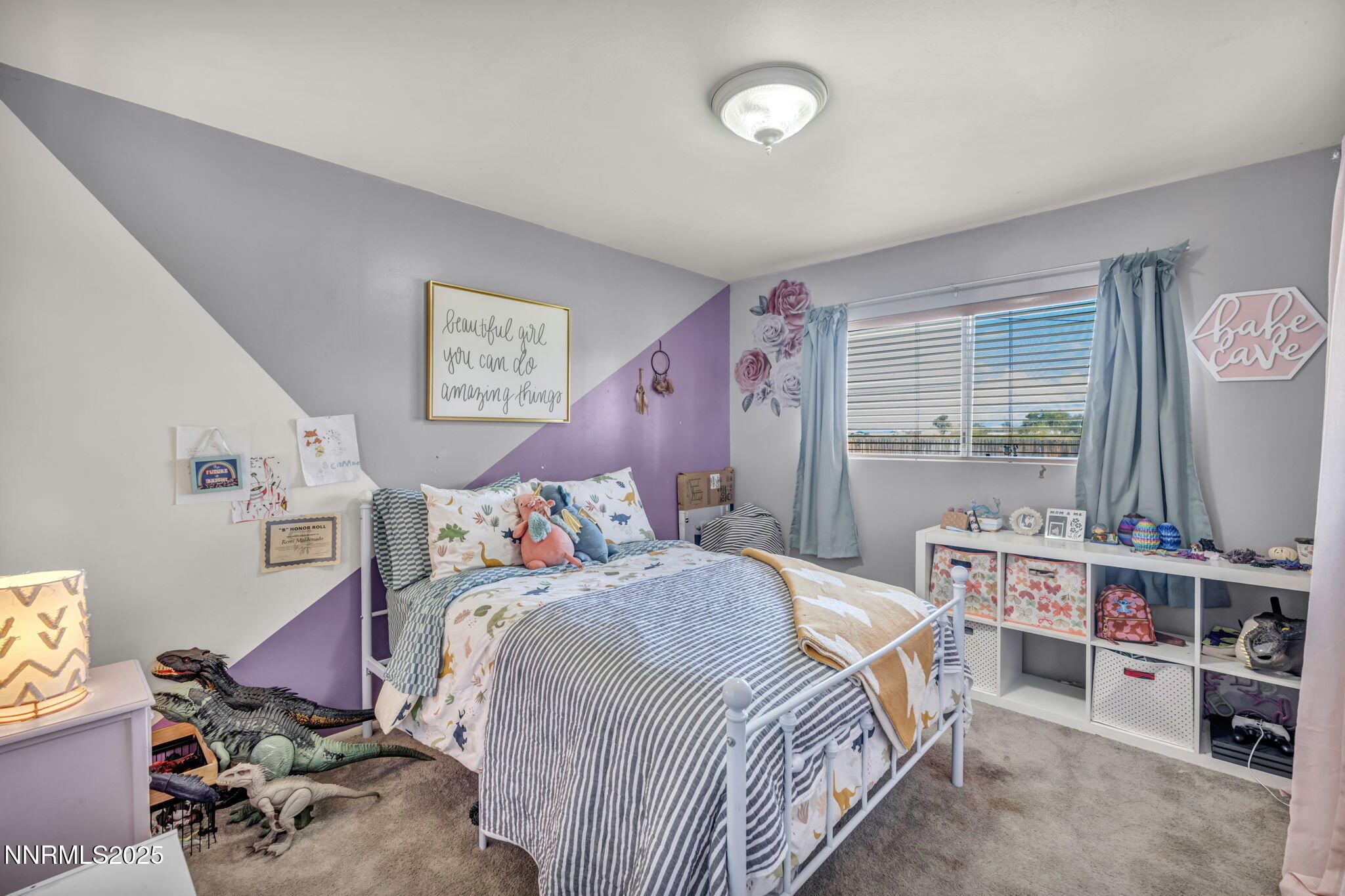 2998 Alcorn Road Fallon, NV 89406 - Photo 34 of 42 a bedroom with a bed a flat screen tv and a window