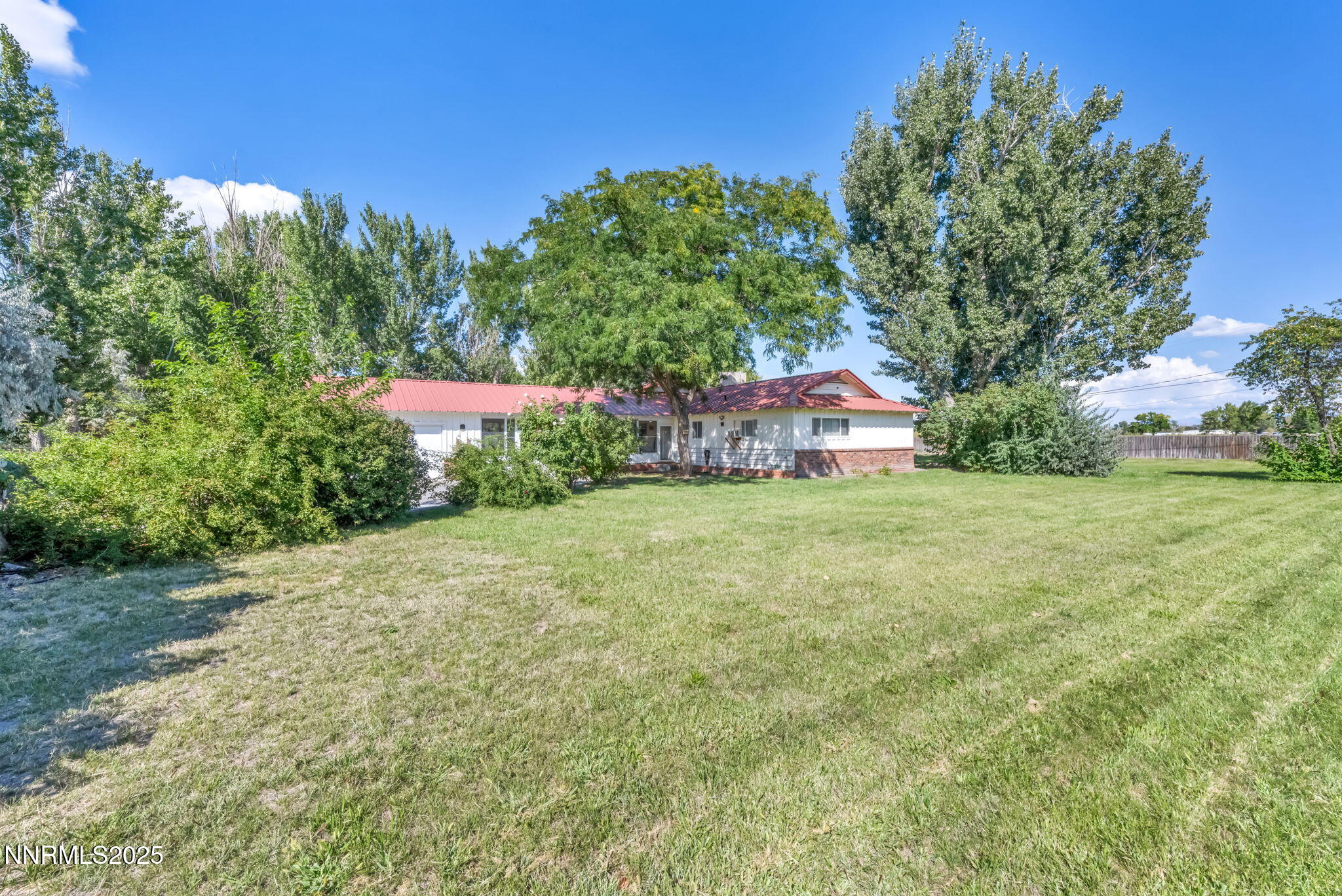 2998 Alcorn Road Fallon, NV 89406 - Photo 41 of 42 a backyard of a house with lots of green space
