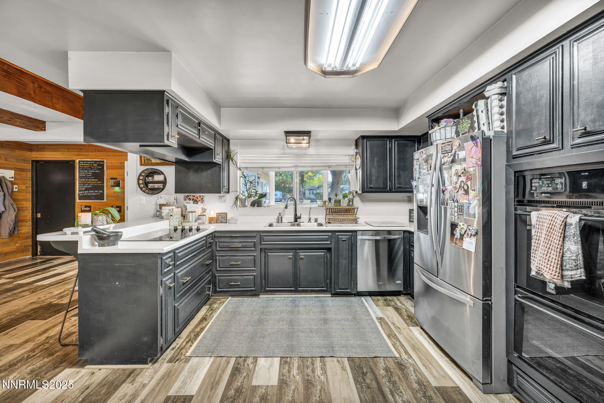 2998 Alcorn Road Fallon, NV 89406 - Photo 9 of 42 a kitchen with stainless steel appliances granite countertop a sink stove and refrigerator