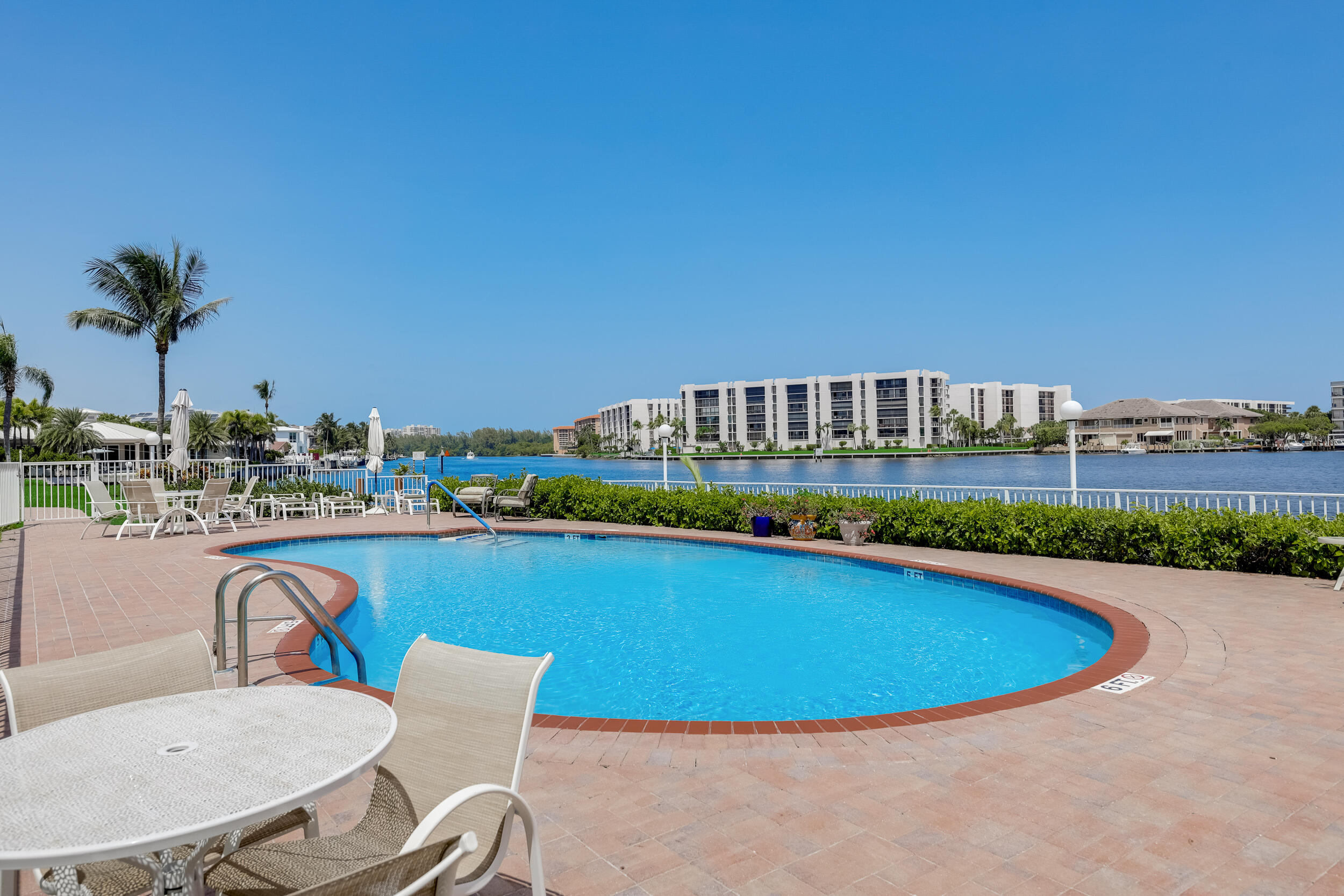711 Northeast Harbour Terrace, Unit 4120 Boca Raton, FL 33431 - Photo 26 of 28 25 Pool facing NE