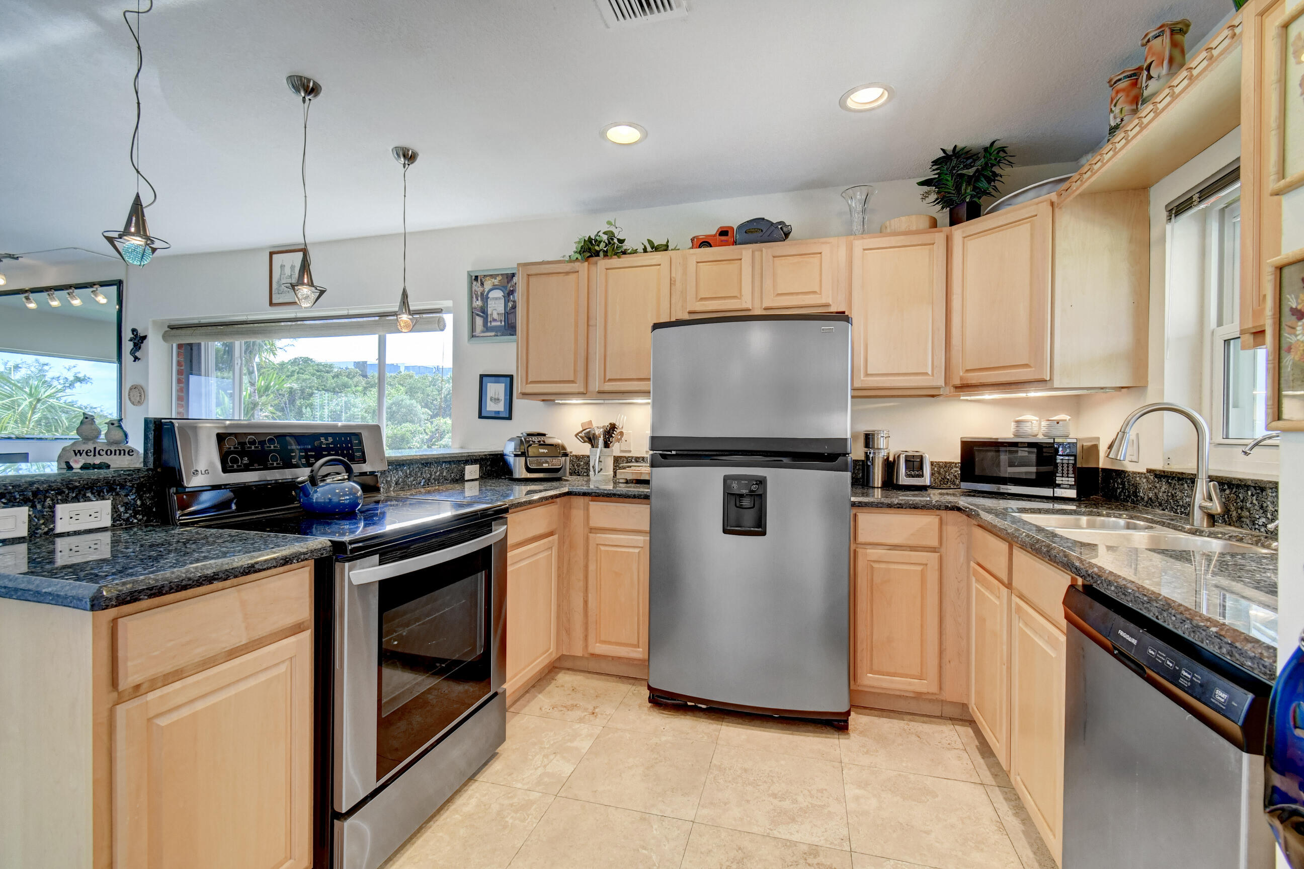 711 Northeast Harbour Terrace, Unit 4120 Boca Raton, FL 33431 - Photo 9 of 28 10b Kitchen close up WSW