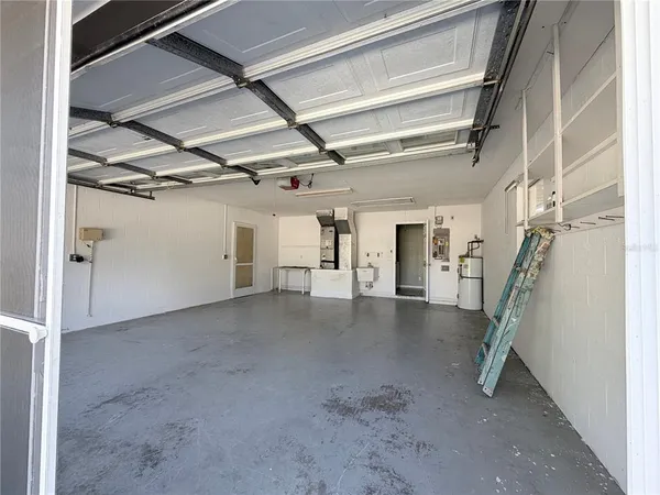 a view of empty room with stairs