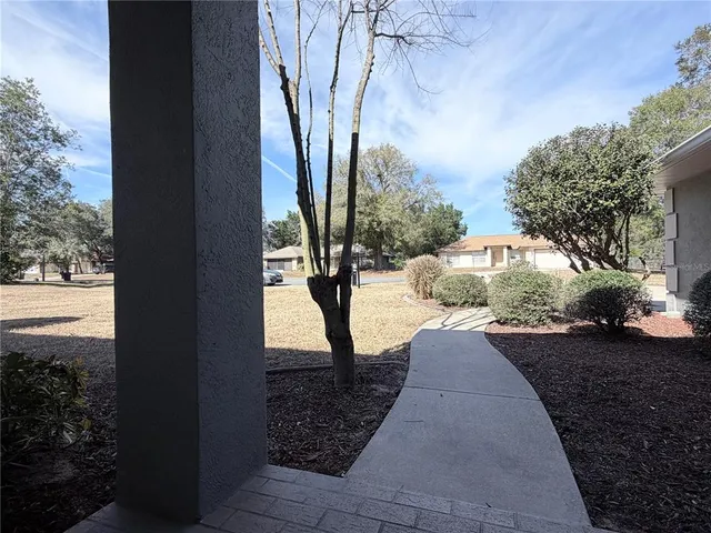 a view of a hallway with entryway