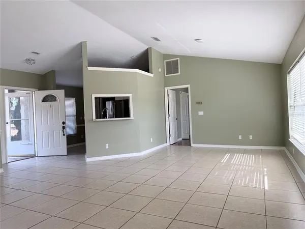 a view of a hallway with closet area