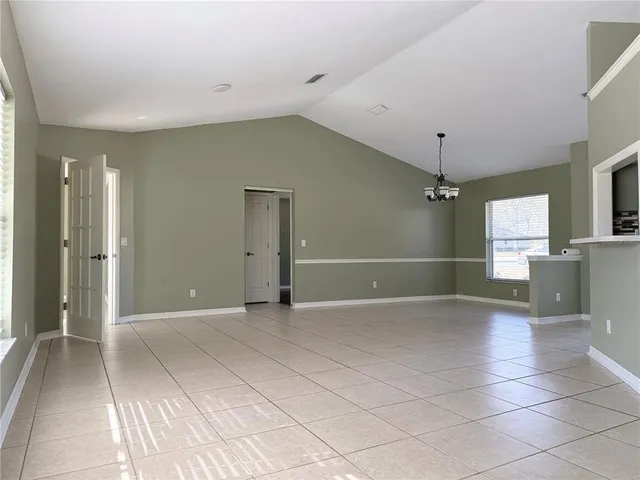 a view of a hallway with a window