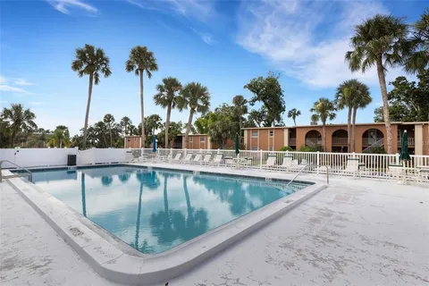 front view of a house with a swimming pool