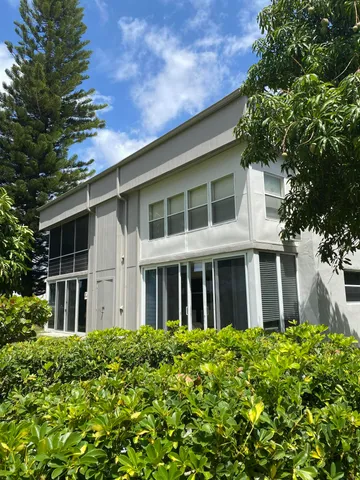 a view of a building with a garden