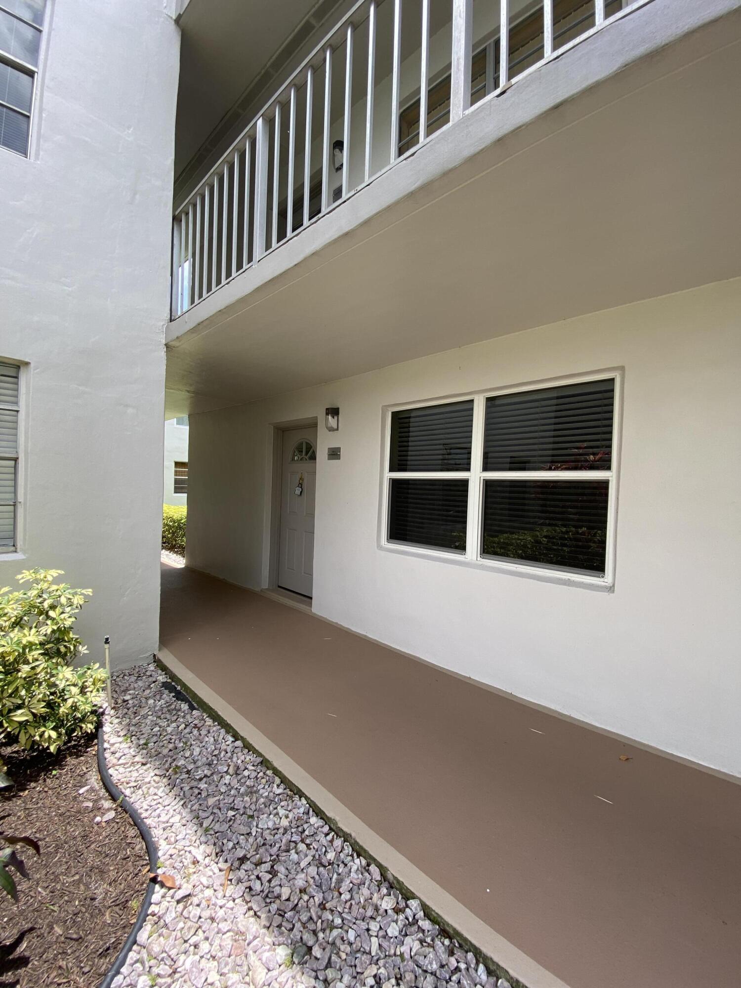 148 Normandy Lane Delray Beach, FL 33484 - Photo 25 of 29 a view of a balcony
