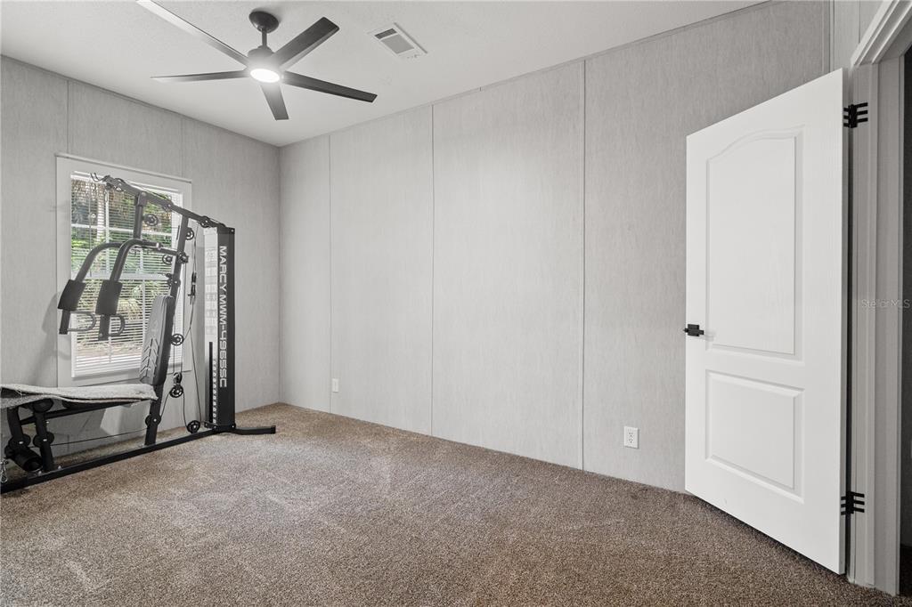 375 Sapp Street Inglis, FL 34449 - Photo 26 of 36 a view of room with walk in closet