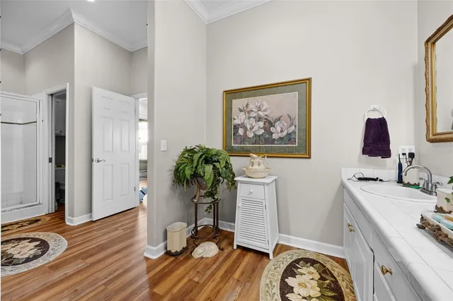 a room with furniture a flat screen tv and a window