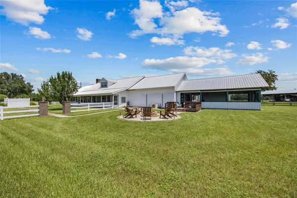 a room with furniture and a book shelf