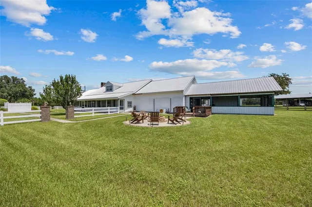 a room with furniture and a book shelf