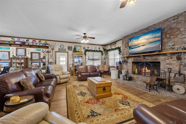 a en suite bathroom with a granite countertop sink and a mirror