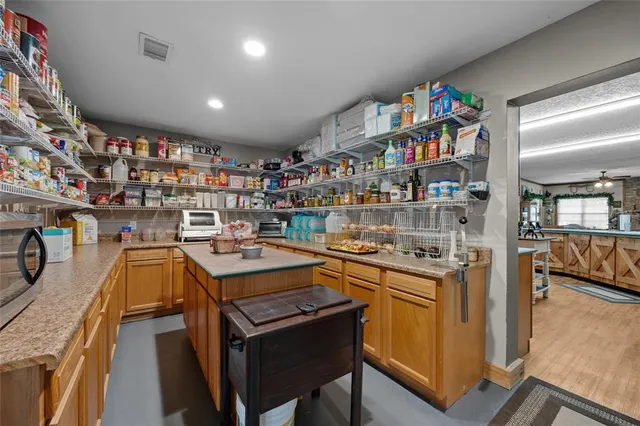 a view of a table and chairs in the garden