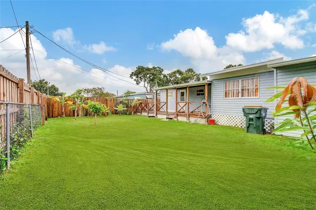 a view of a backyard with garden