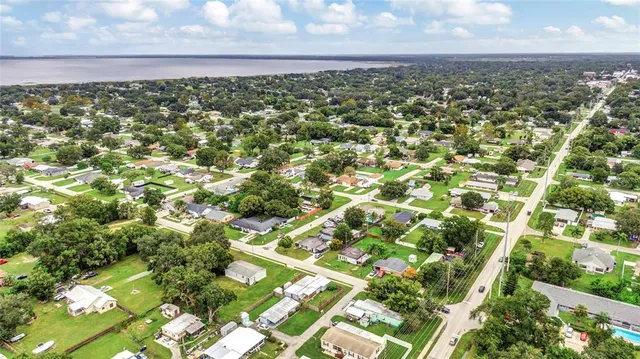 an aerial view of a house with a garden