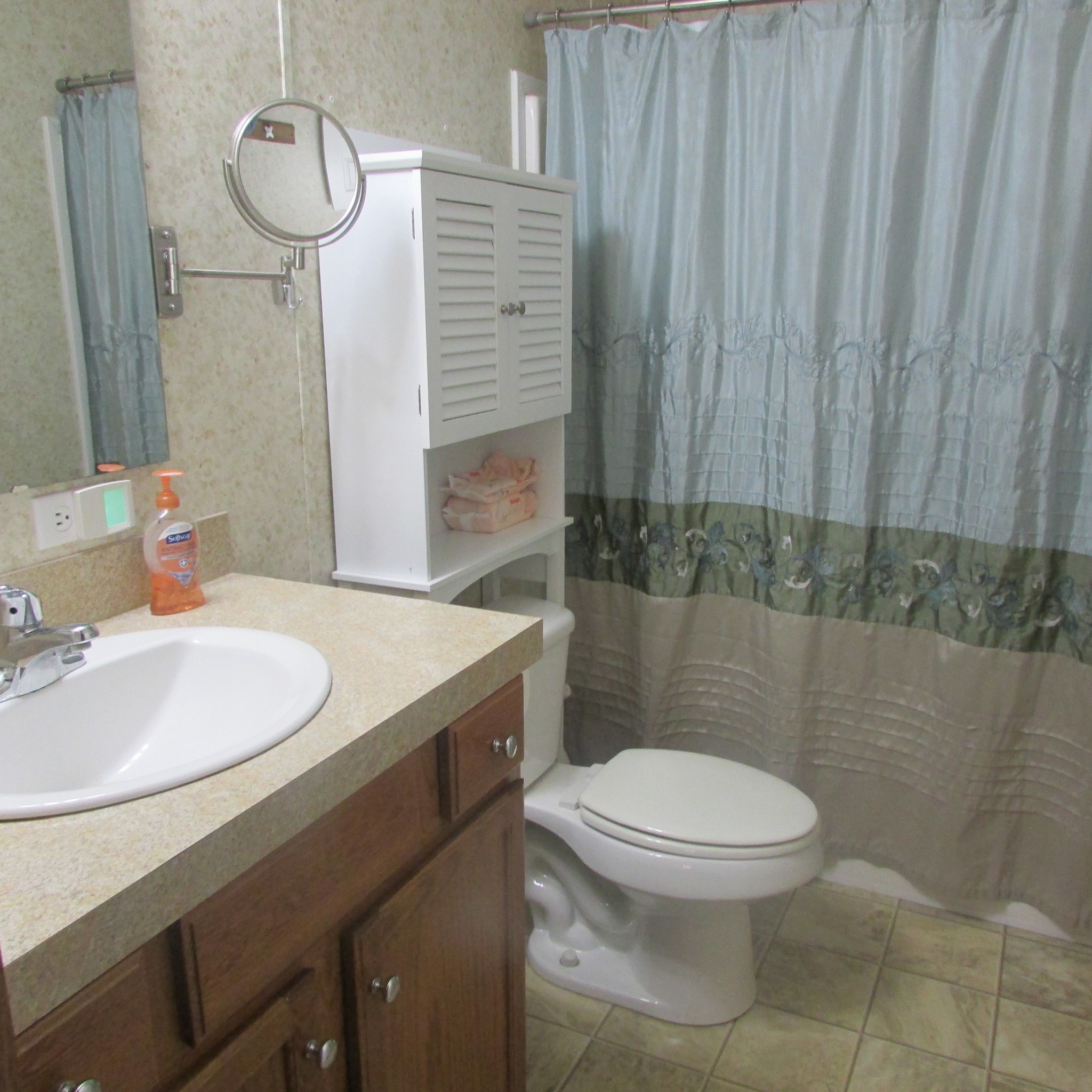 75 Snell Road Ethridge, TN 38456 - Photo 20 of 51 a bathroom with a sink a toilet and shower
