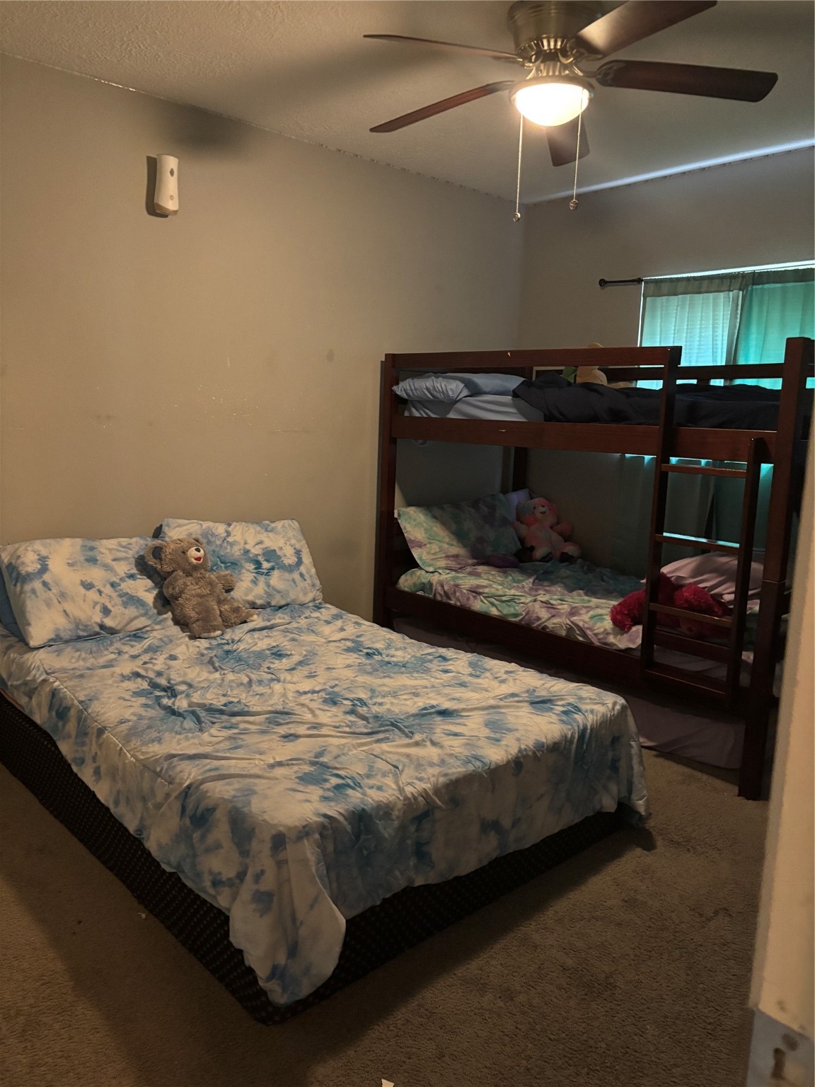 22223 Spring Gate Drive Spring, TX 77373 - Photo 13 of 15 a bedroom with a bed and a mirror