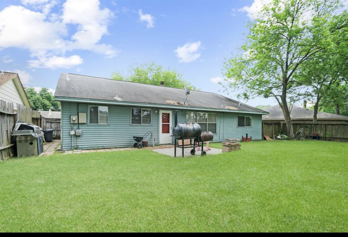 22223 Spring Gate Drive Spring, TX 77373 - Photo 5 of 15 a view of a house with backyard porch and sitting area