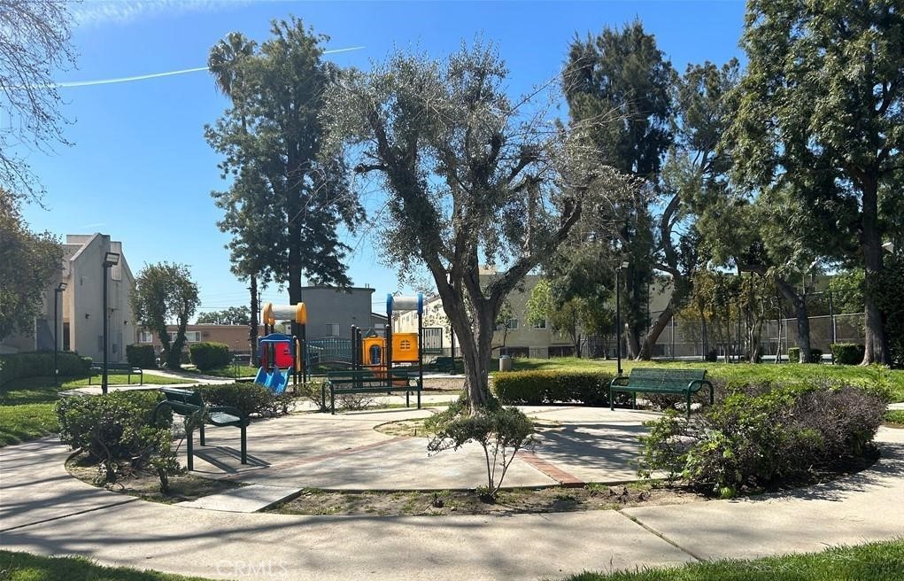 7651 Reseda Boulevard, Unit 12 Reseda, CA 91335 - Photo 3 of 6 a view of a park with plants and trees