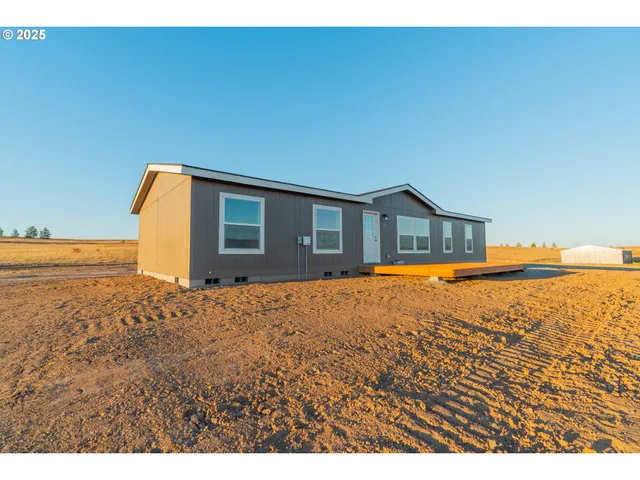 a house view with a swimming pool