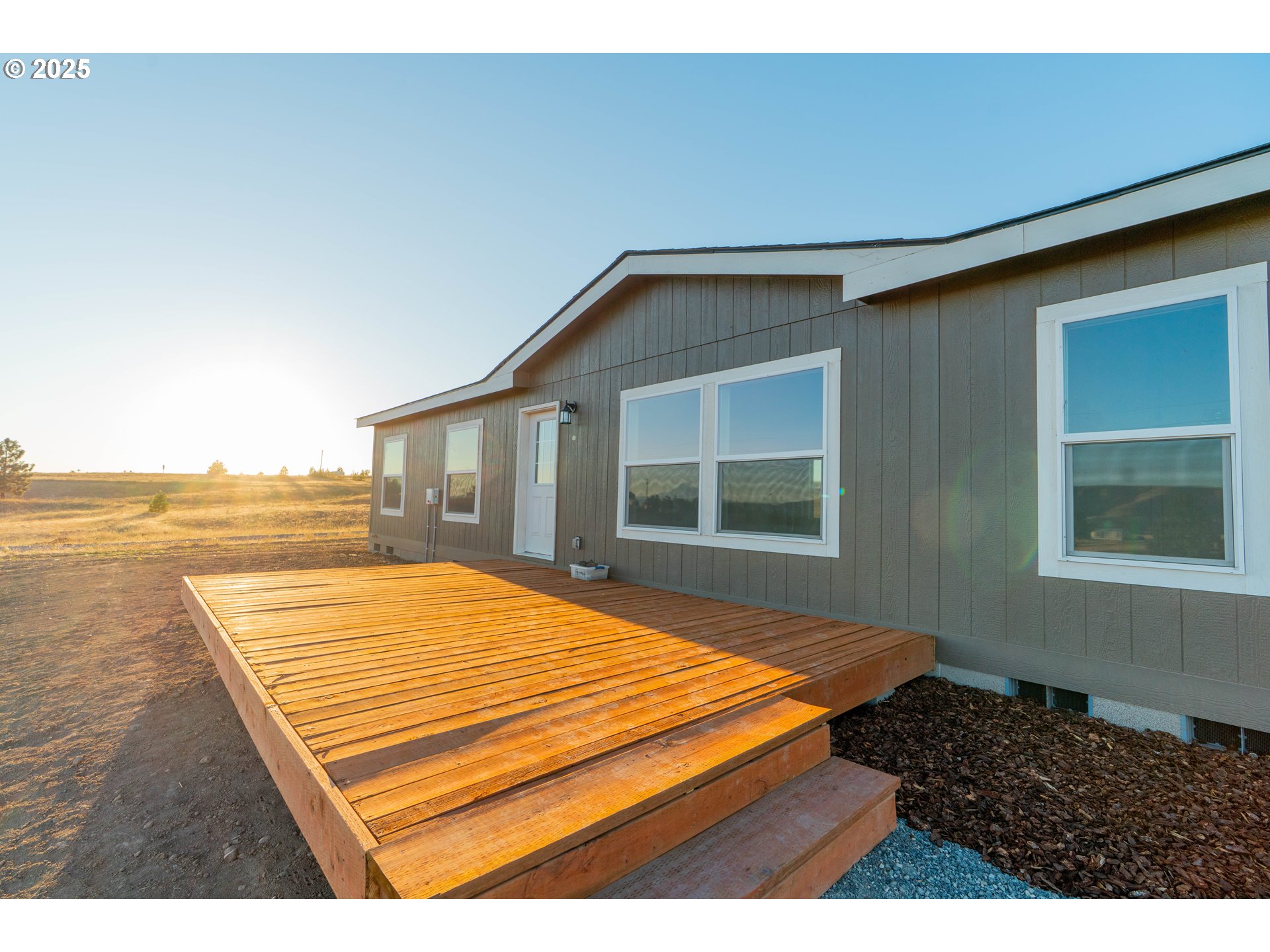 959 High Prairie Road Lyle, WA 98635 - Photo 2 of 34 a swimming pool with wooden floor