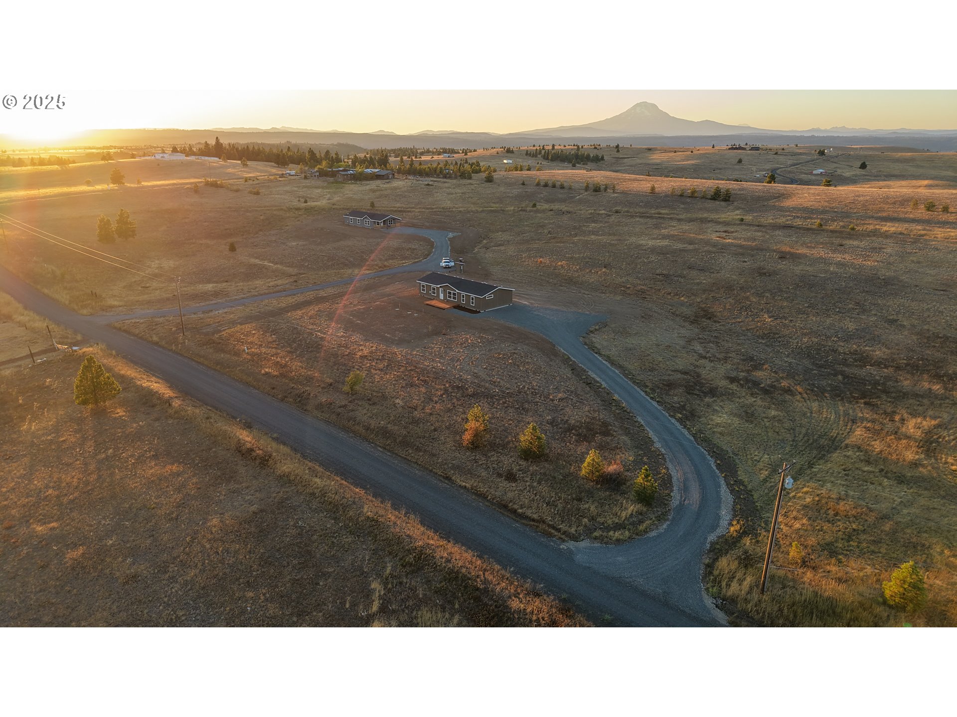 959 High Prairie Road Lyle, WA 98635 - Photo 3 of 34 a black and white photo of a house