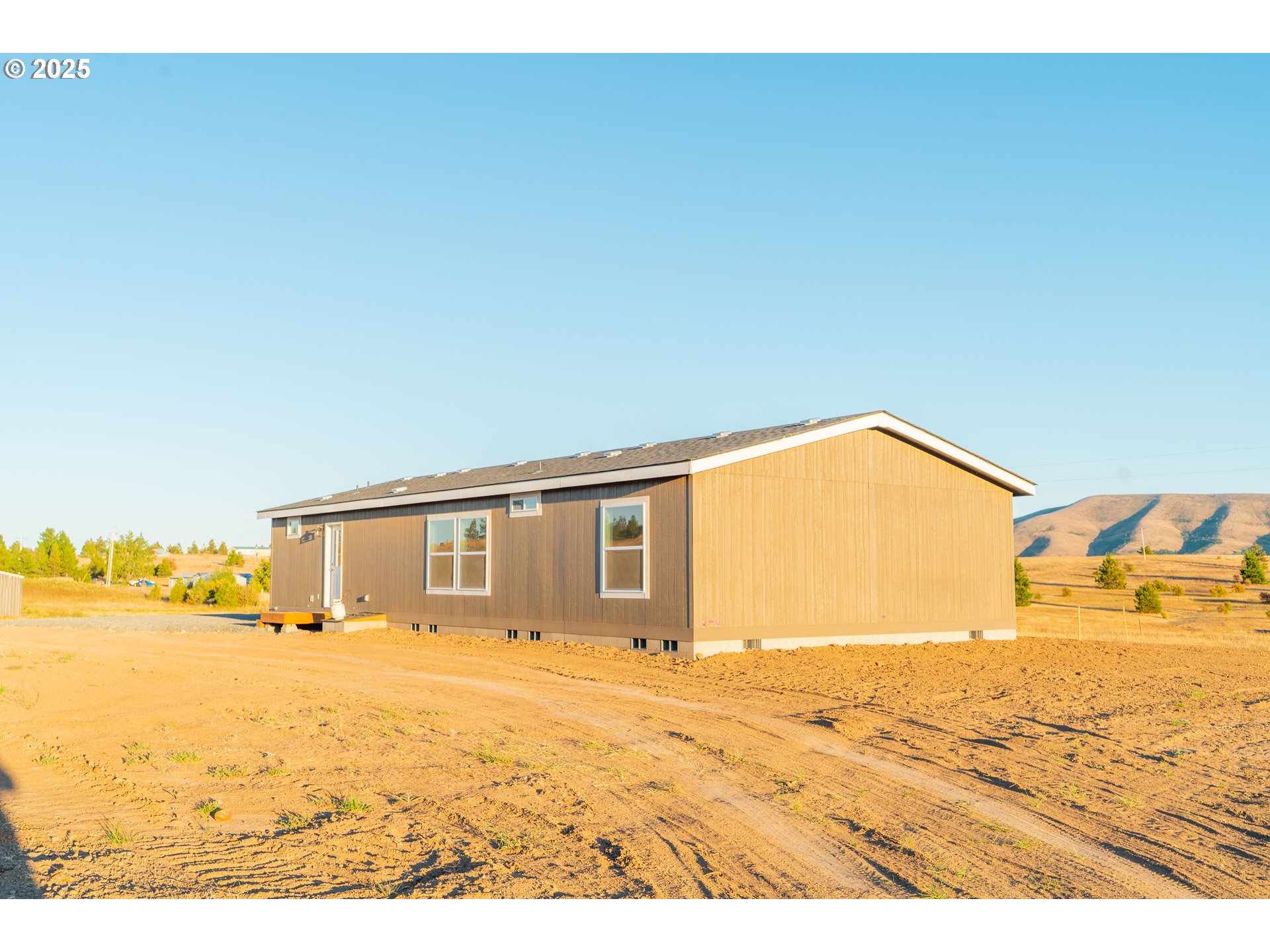 959 High Prairie Road Lyle, WA 98635 - Photo 31 of 34 a view of empty room with wooden floor