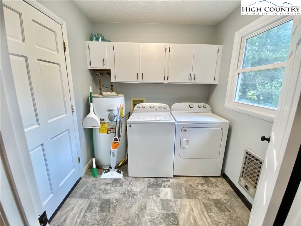 272 Clint Lewis Road Boone, NC 28607 - Photo 13 of 32 a utility room with dryer and washer