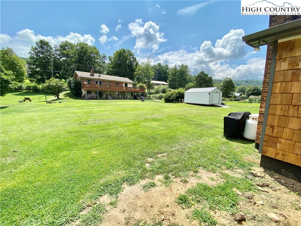 272 Clint Lewis Road Boone, NC 28607 - Photo 27 of 32 a house view with a garden space