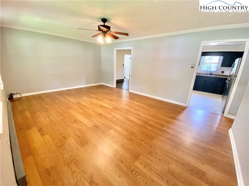 272 Clint Lewis Road Boone, NC 28607 - Photo 6 of 32 a view of empty room with wooden floor