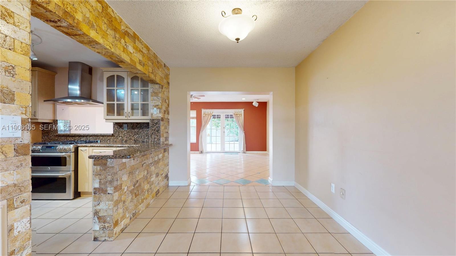 6051 Southwest 110th Avenue Miami, FL 33173 - Photo 18 of 49 a view of a kitchen with granite countertop cabinets